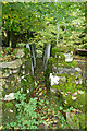 SD9796 : Footbridge above the falls in Haverdale Beck by Andy Waddington