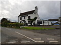 SO8160 : The Hunters Lodge pub with dutch barn by Jeff Gogarty