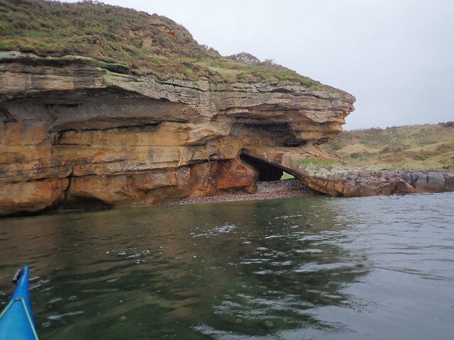 Tunnel through sandstone at Clashach Cove