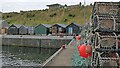 ND3650 : Creels and fishermen's sheds, Wick Harbour, Caithness by Claire Pegrum