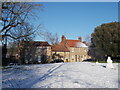 TF1606 : Peakirk village green in the snow by Paul Bryan