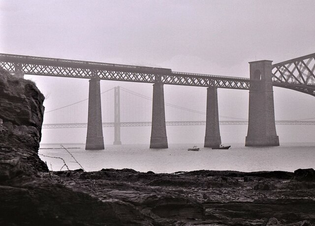 Train heading over the Forth Bridge