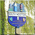 TF6422 : South Wootton village sign by Adrian S Pye