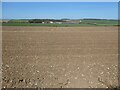 SE9472 : View across Wad Dale to Moor Farm and Moor Plantation by Christine Johnstone