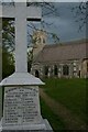 TM4365 : St Peter's church, Theberton, and the village war memorial by Christopher Hilton