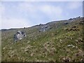 NN5723 : A group of boulders, Glen Kendrum by Richard Webb