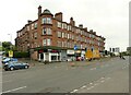 NS5467 : Tenements with shops, Crow Road by Richard Sutcliffe