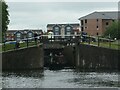 SJ3492 : Two narrowboats leaving Stanley Lock 1 by Christine Johnstone