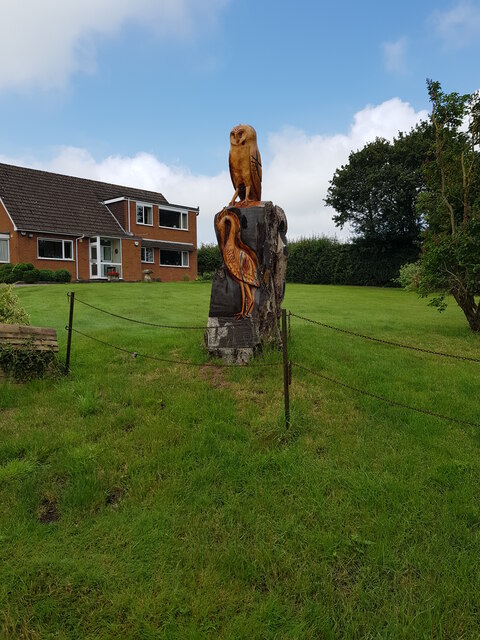 Carving at The Well House, Earl's Common