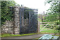 SO3503 : Ornamental gate (L), The Spinney, Estavarney Lane by M J Roscoe