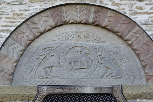 Tympanum above door to Pipe Aston church