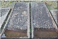 SO4472 : Cast iron grave memorial slabs by Philip Halling