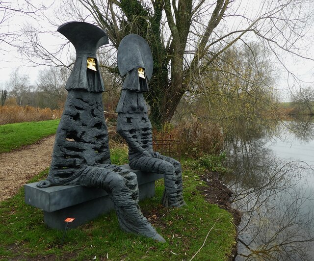 Sculpture by the lakes - Watchers by the lake