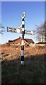 NY4261 : Cumberland County Council finger signpost at T-junction in Longpark by Roger Templeman