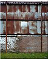 NS4969 : Wall and fence by Richard Sutcliffe