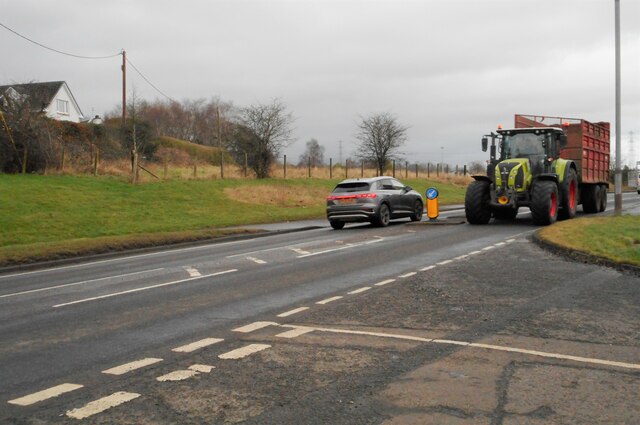 A passing tractor and trailer