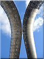 SP3379 : Whittle Arch and wispy clouds by Neil Owen