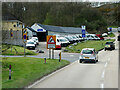 SX3860 : A38 passing Riverside Vans at Notter by David Dixon