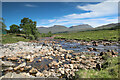 NN2542 : Abhainn Shira flows past the Clashgour Hut by Andy Waddington