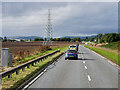  : Power Lines crossing the A9 near Tomich by David Dixon