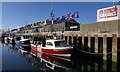 HY4411 : Platinum Jubilee flags, Kirkwall Harbour, Orkney by Claire Pegrum