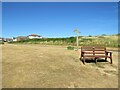 TQ4001 : Bench and signpost, Peacehaven by Malc McDonald