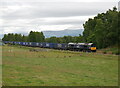 NN7299 : Train passing the Highland Folk Museum by Craig Wallace