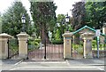 NY9964 : Main Gates to Bythorne House by Robert Graham