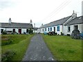 NM7317 : Easdale - Whitewashed cottages in the centre of the village by Rob Farrow