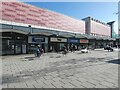 SJ8990 : Shops on Mersey Square by Gerald England