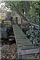 SP6986 : Wooden footbridge over the Welland by Bob Harvey