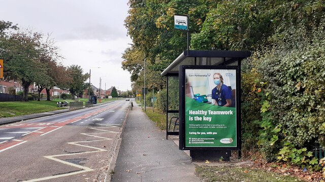 View along Waldridge Road with bus stop on NW side