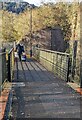 SO1707 : Walking across a footbridge over the Ebbw, Ebbw Vale by Jaggery