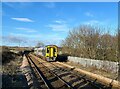 NZ4441 : Train approaching Horden Station by Adrian Taylor