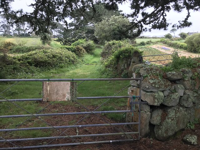 Gate with faded sign