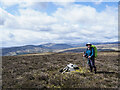 NN6866 : Hill walker at summit area of Sròn Chon by Trevor Littlewood