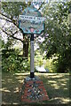 TL8336 : Wickham St Paul Village sign by Geographer