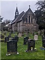 ST5598 : Headstones and church, Tidenham Chase, Gloucestershire by Jaggery