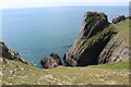 SS0997 : Sea cliff and islet, Lydstep Peninsula by M J Roscoe