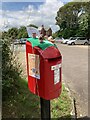 SX9886 : Royal Mail letter box with knitted topping, Exton by David Smith