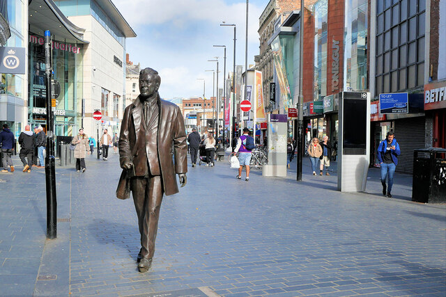 Brian Epstein walking on Whitechapel