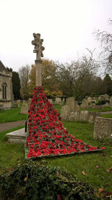 Poppies on the war memorial at St. Benedict's church, Glinton