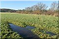 SU4622 : Frozen puddle in field beside Kiln Lane by David Martin