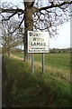 TG2221 : Buxton With Lamas Village Name sign by Geographer