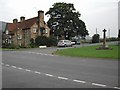 NZ4400 : Ingleby Cross and the Bluebell Inn by Tom Courtney