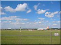 TL1220 : Luton Airport runway by Jack Hill