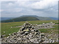 NX5182 : Summit cairn of Meikle Millyea looking towards Milldown by Chris Wimbush