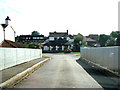 SE5325 : Beal,  The Hungry Fox Pub, viewed from the bridge over the River Aire. by Bill Henderson