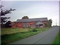 TM3373 : Farm Buildings at Hill Farm by Geographer