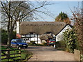 SO9665 : Thatched cottage at Piper's Hill by Trevor Rickard